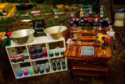 The potion bar: shelves of coloured jars beside a chalkboard reading "You belong here"